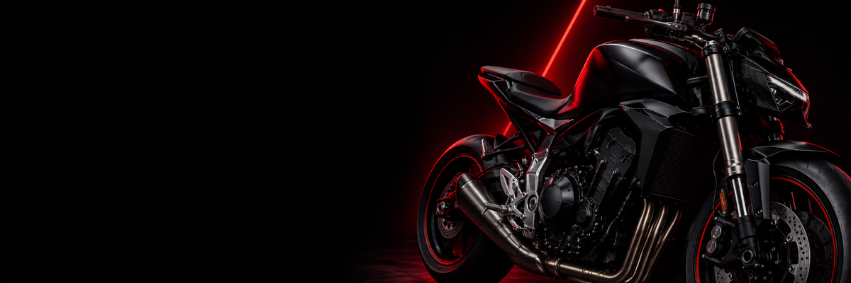 Concept motorcycle in a dark studio with red accent lighting